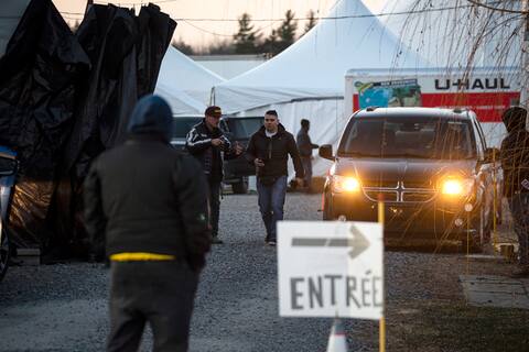 A black canvas was installed to block visibility at the Saint-Charles-sur-Richelieu property where Hell's Party was held on Saturday.