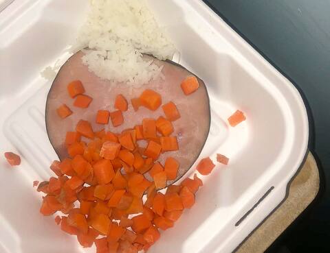 At Cité-de-la-Santé he was served a plate of ham, rice and carrots.