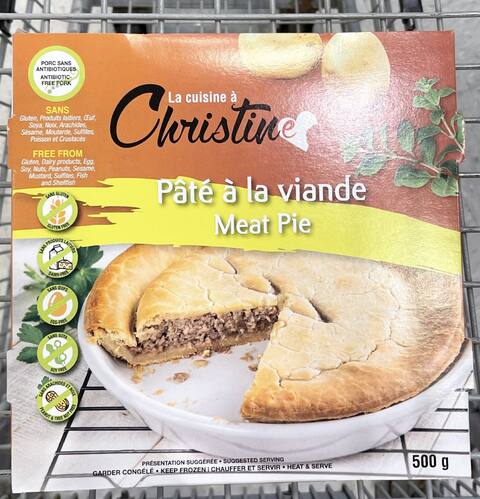 Homemade Canadian Tourtiere(Holiday Meat Pie) on a white wooden background, top view. Flat lay, overhead, from above. Copy space.