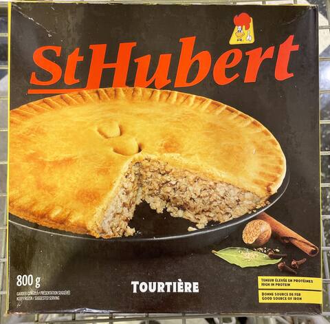 Homemade Canadian Tourtiere(Holiday Meat Pie) on a white wooden background, top view. Flat lay, overhead, from above. Copy space.