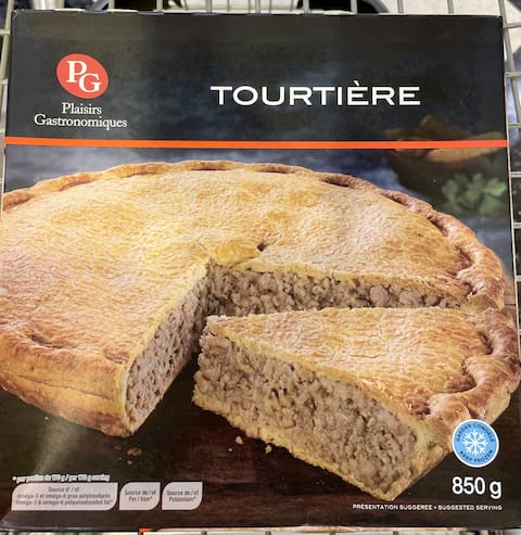Homemade Canadian Tourtiere(Holiday Meat Pie) on a white wooden background, top view. Flat lay, overhead, from above. Copy space.