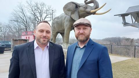 Sean Dyke, CEO of the St. Thomas Economic Development Corporation, and Paul Jenkins, CEO of the St. Thomas & District Chamber of Commerce, in front of the Jumbo elephant, the emblem of the city which acquired, at the turn of the last century , the status of