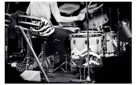 April 1975, Nick Mason playing his Ludwig drum set adorned with the Hokusai Wave artwork, hand painted by Kate Hepburn, at the Los Angeles Memorial Sports Arena, USA.