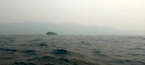 In Roatan, the air is thick with smoke from mainland wildfires.