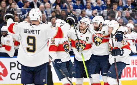 Sam Bennett is expected by his teammates to celebrate his goal scored in the second period.