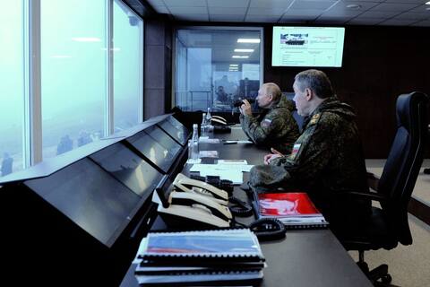 Amid shift toward Asia, Putin oversees maneuvers with China