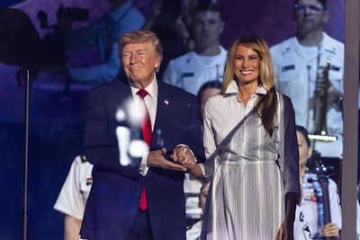 July 4, 2026, Washington, District of Columbia, USA: U.S. President Donald Trump and First Lady Melania Trump prepare to speak during the