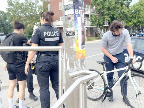 Faycal El Aoufir stole the bike market Seller speaks with police officers upon arrival at the scene.