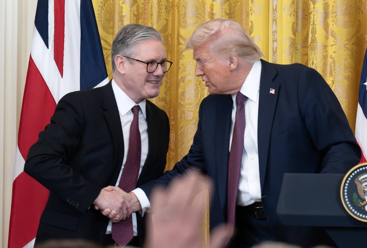 British Prime Minister Keir Starmer and US President Donald Trump shake hands during a press conference at the White House on February 27, 2025.