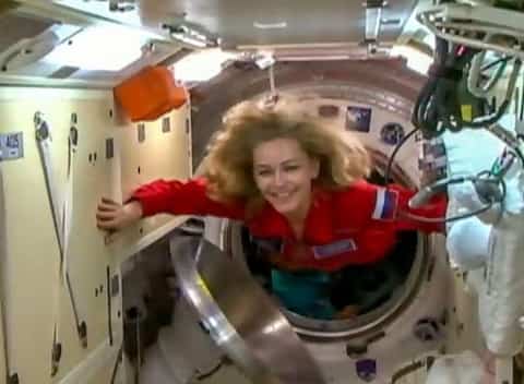 A Russian team aboard the International Space Station to sign the first film in orbit