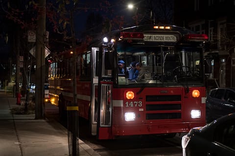 The Montreal Fire Department's red bus is deployed to help disaster victims.