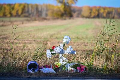 A cross has been planted where a teenager was tragically hacked to death on a scooter on Chemin Sainte-Thérèse in Carignan, Monterrey.