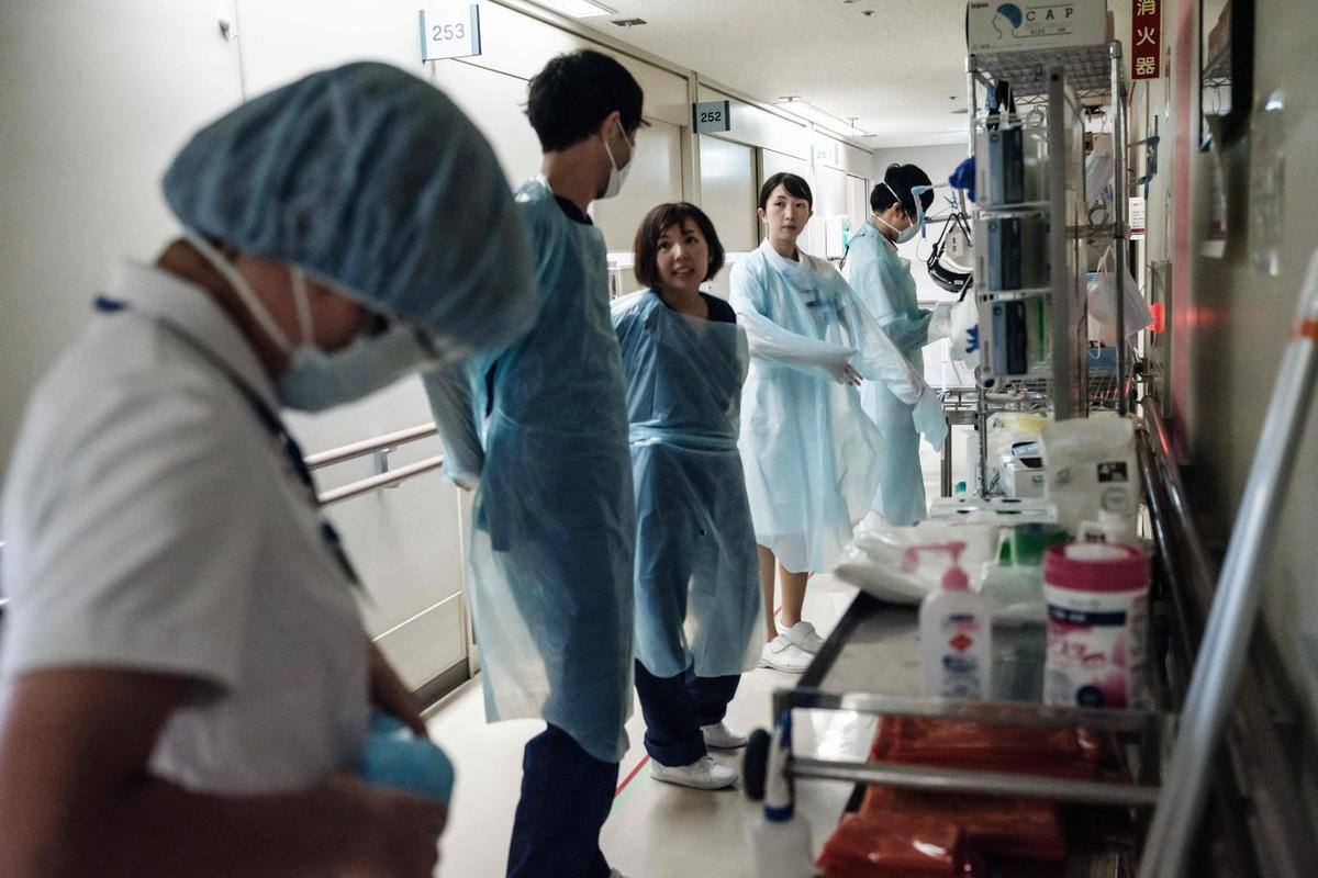 New record high COVID-19 cases in Tokyo, restrictions extended across the country