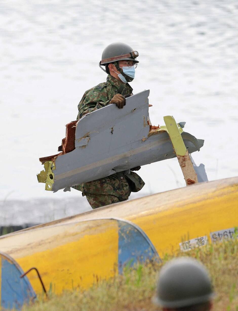 Japan Plane Crash: Body Found Japan Plane Crash: Body Found