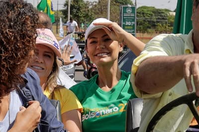 Brazil's First Lady Michelle Bolsonaro gestures during a motorcade as supporters of Brazilian President and re-election candidate Jair Bolsonaro demonstrate against the Federal Supreme Court and the Superior Electoral Tribunal, in Brasília, Brazil, October 29, 2022.
