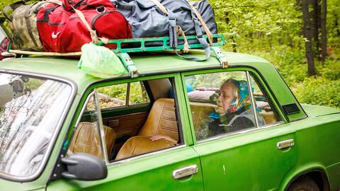 The elderly man fled his hometown of Ruska Lozova and was waiting in a evacuation area in Kharkiv, Ukraine, on Friday.