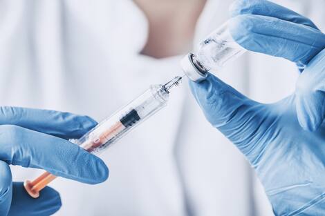 injecting injection vaccine vaccination medicine flu woman doctor injecting injection vaccine vaccination medicine flu woman doctor