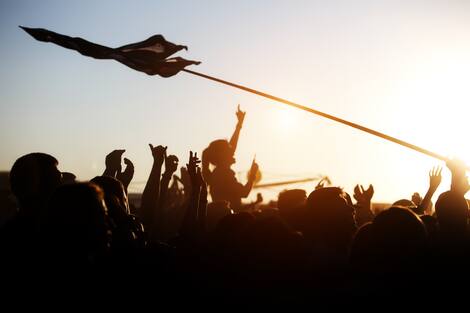 Girl cheering at outdoor music, rock festival Girl cheering at outdoor music, rock festival