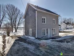 Île d'Orléans: maison ancestrale au bord du fleuve