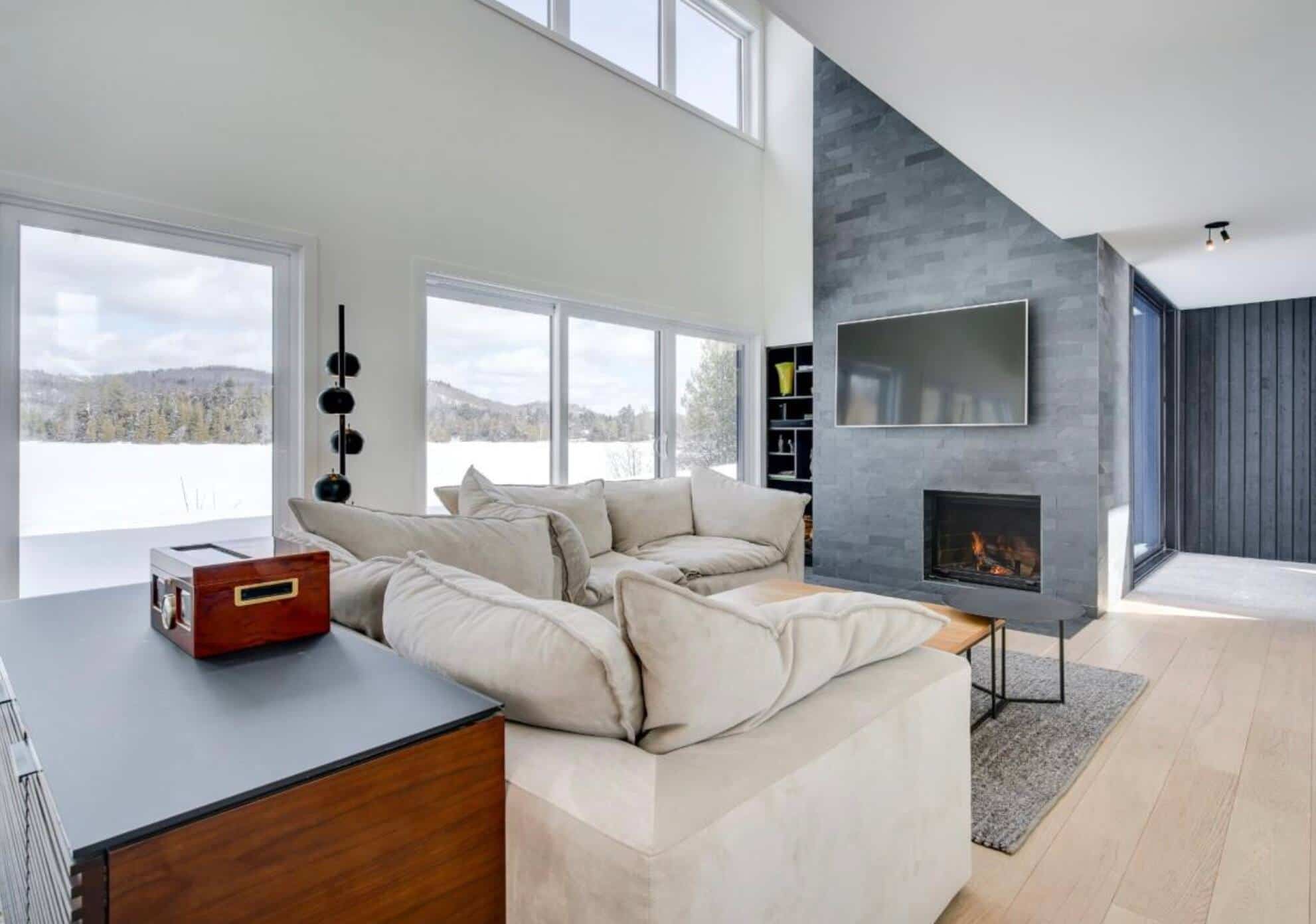 An allblack Scandinavian home on the waterfront in SaintAdolphed