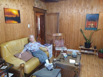 Christian Boucher in front of his house in Saint-Georges-de-Beaus. She pays $800 a month in rent to live there.