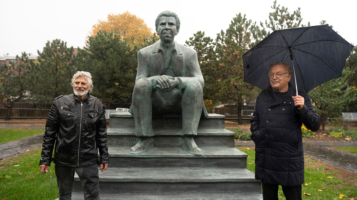 A statue in the image of Dany Laferrière in front of BAnQ 1