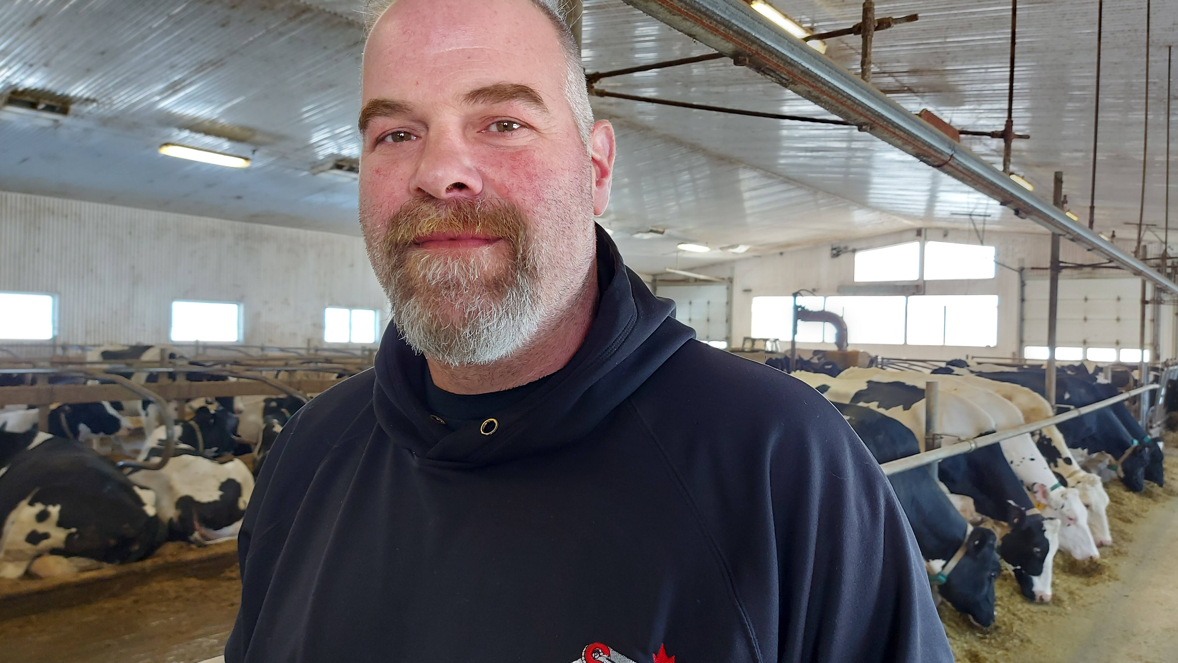 Jean Guilbert, a dairy producer from Saint-Maurice, opposes the TES Canada wind turbines which are regarding to flourish in his town.