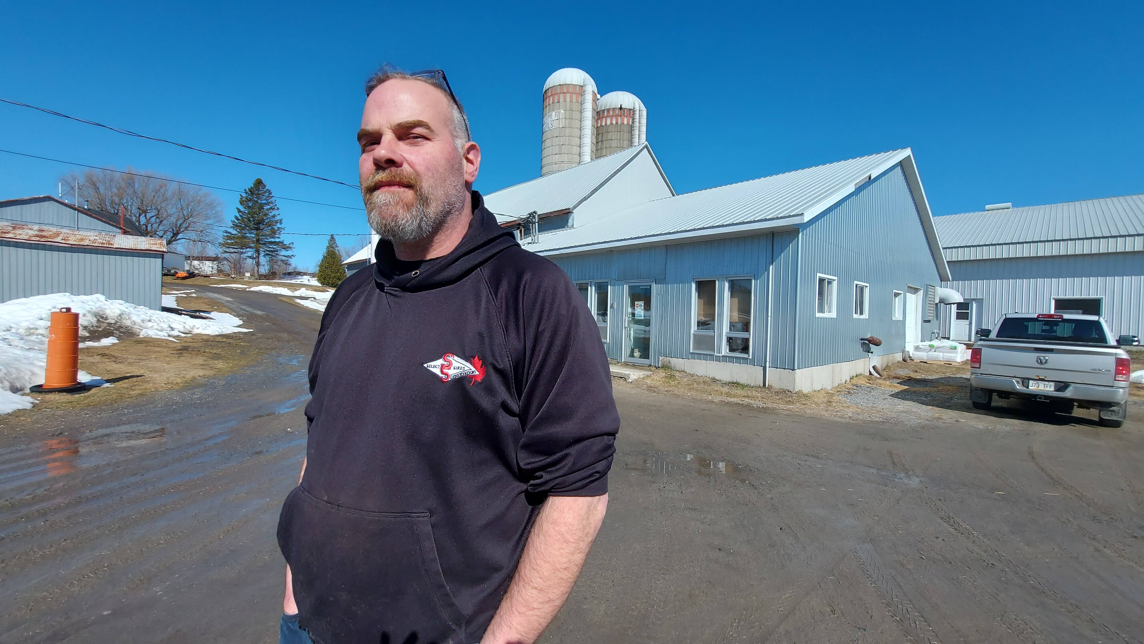 Jean Guilbert, a dairy producer from Saint-Maurice, opposes the TES Canada wind turbines which are regarding to flourish in his town.