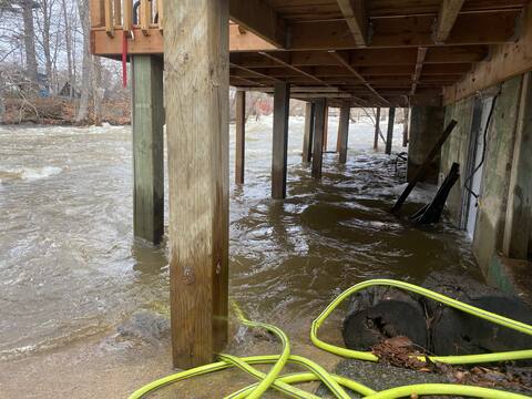 The building where Kim Leonard lives with her family is one of the most vulnerable when the North River levels rise.