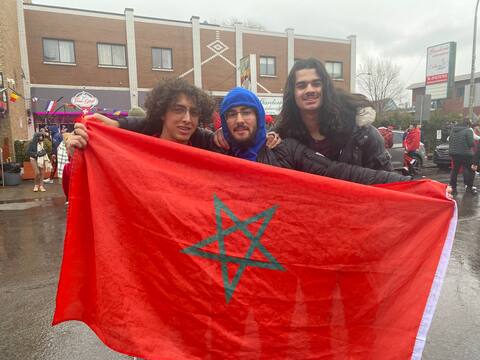 Hamza Lahmi (left), whose family is originally from Morocco, was accompanied by his Algerian-born friends Chabik Selhi and Ryan Omar Yadi to celebrate Morocco's victory.