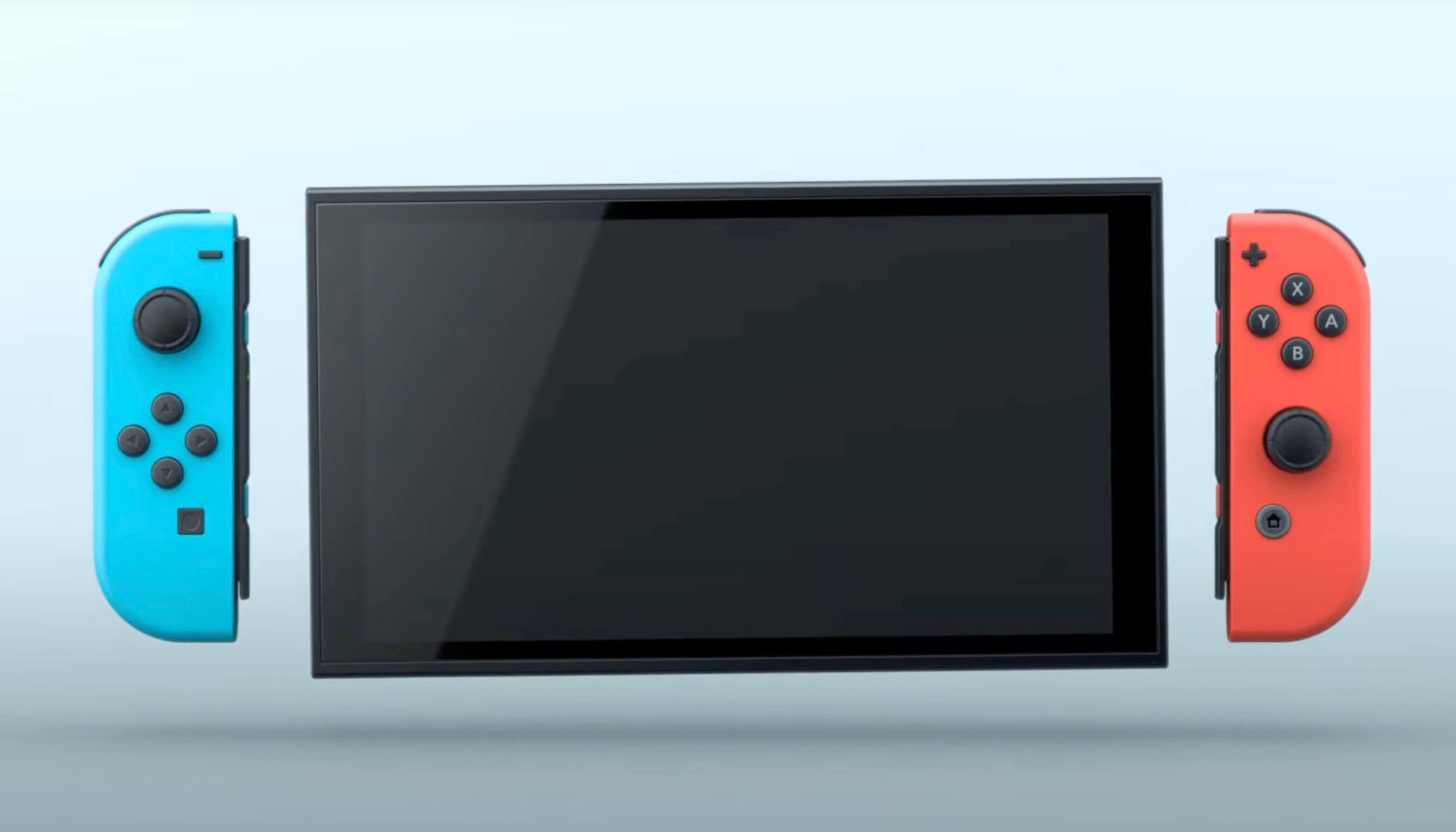 Le nouvel écran de la Nintendo Switch 2 à côté des manettes Joy-Con de la console précédente.