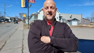 Jean Guilbert, a dairy producer from Saint-Maurice, opposes the TES Canada wind turbines which are regarding to flourish in his town.
