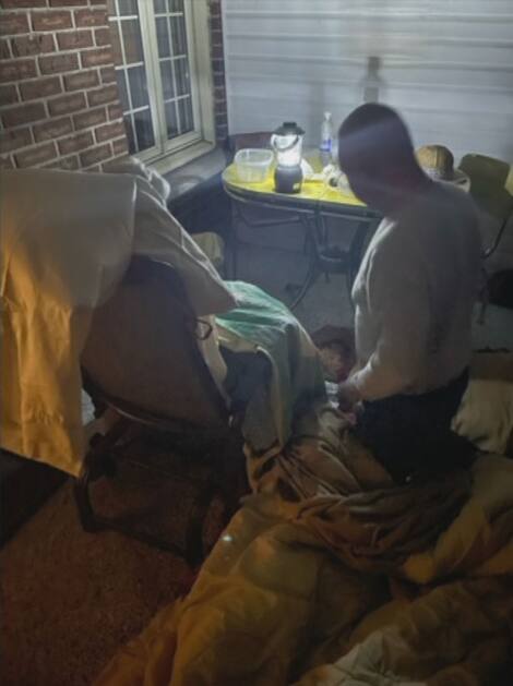 Mark Bourque helps him on his mother's balcony