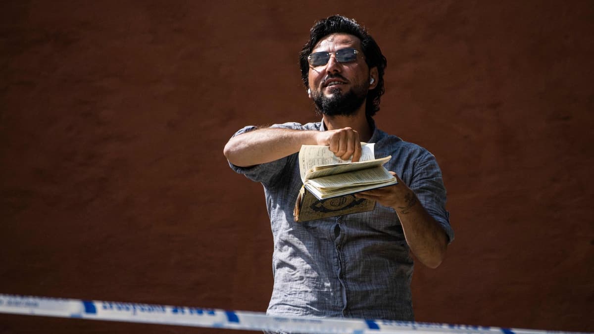 Sweden: A man burns pages of the Koran in front of the largest mosque in Stockholm Sweden: A man burns pages of the Koran in front of the largest mosque in Stockholm