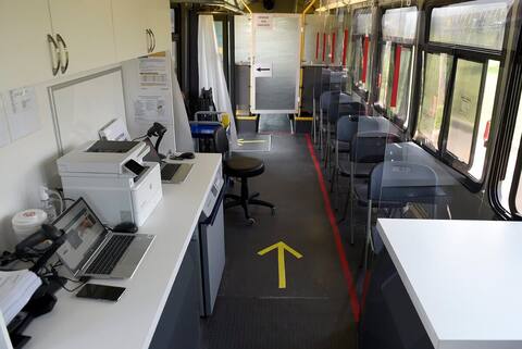 Patricia McKinnon (left), the regional director of immunization, gave Quebec Deputy Premier Genevieve Gilbolt a new vaccine-O-bus tour, praising her ingenious way to reach more people.