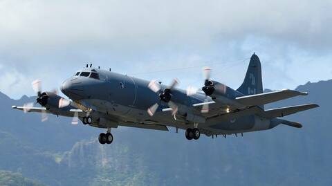 The CP-140 is a long-range patrol aircraft employed to accomplish various types of land and sea missions.
