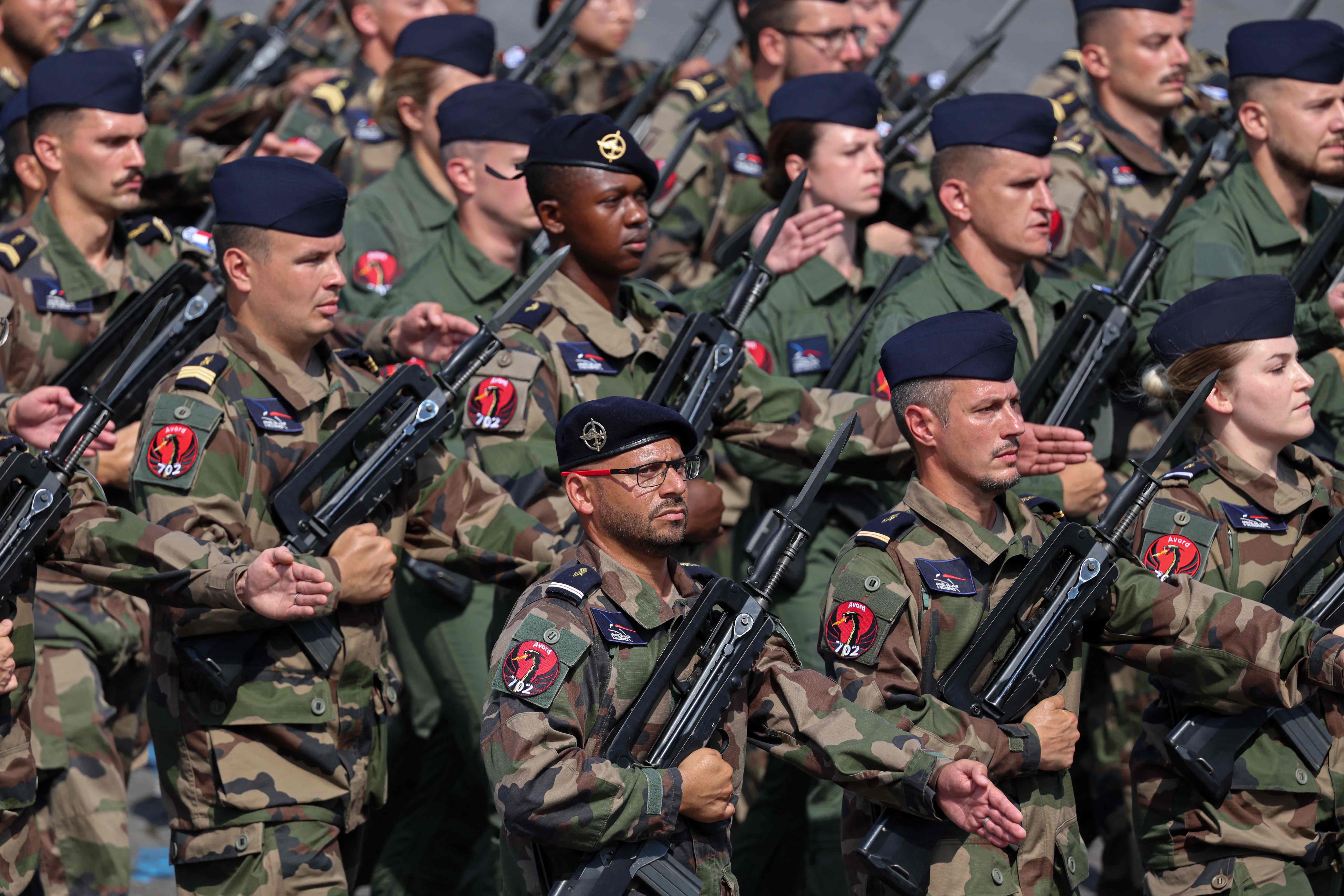 Troops from Air Base 702 of the French Air and Space Force in Avord march during the traditional Bastille Day military parade on the Avenue des Champs-&Eacute;lys&eacute;es in Paris, July 14, 2026.