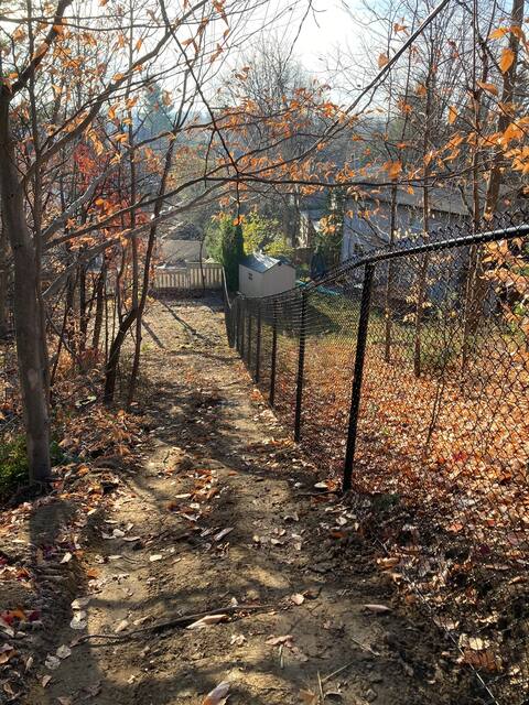 A fence is installed by the city of Terrebonne near land owned by controversial Sunwing flight organizer James William Awad in December 2021 to protect a wooded area threatened by deforestation, Friday, Nov. 4, 2022.