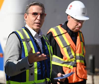 General Director of MNBAQ, Jean-Luk Murray, surrounded by architect Eric Gauthier, Les Architectes Fabg.
