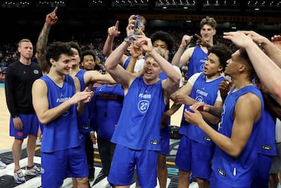 Walter Clayton Fils in action