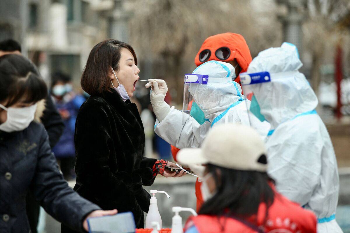 COVID-19: la Chine confine une ville de 9 millions d'habitants