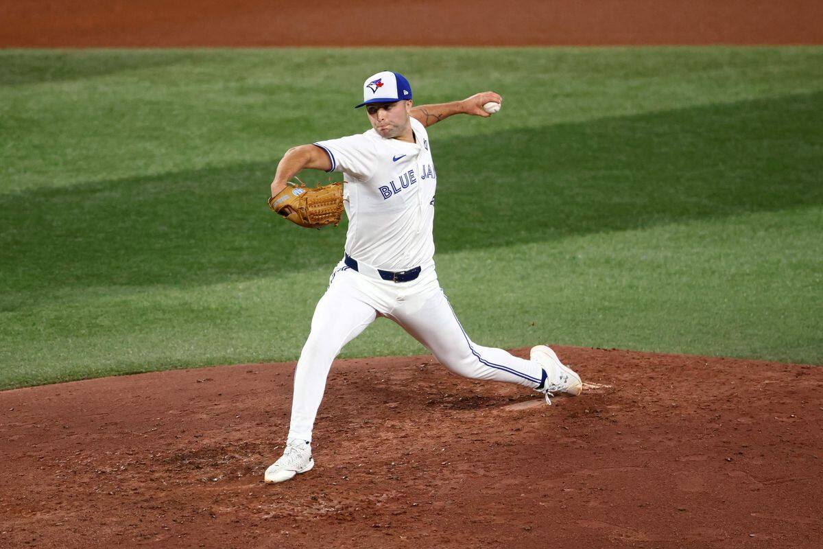 Blue Jays left-handed hitter Mason Fluharty in action on the mound during Game 1 of the World Series, Oct. 24, 2025, in Toronto.