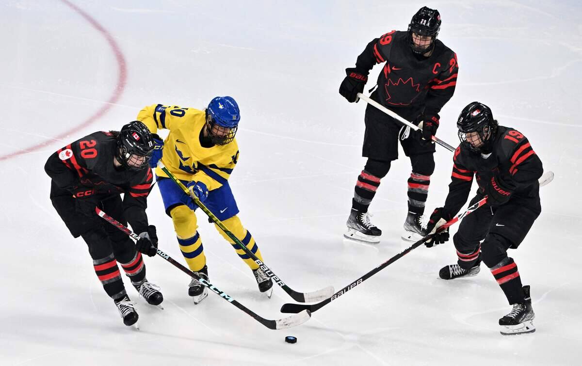 Jeux de P&eacute;kin: Marie-Philip Poulin et le Canada passent en demi-finale