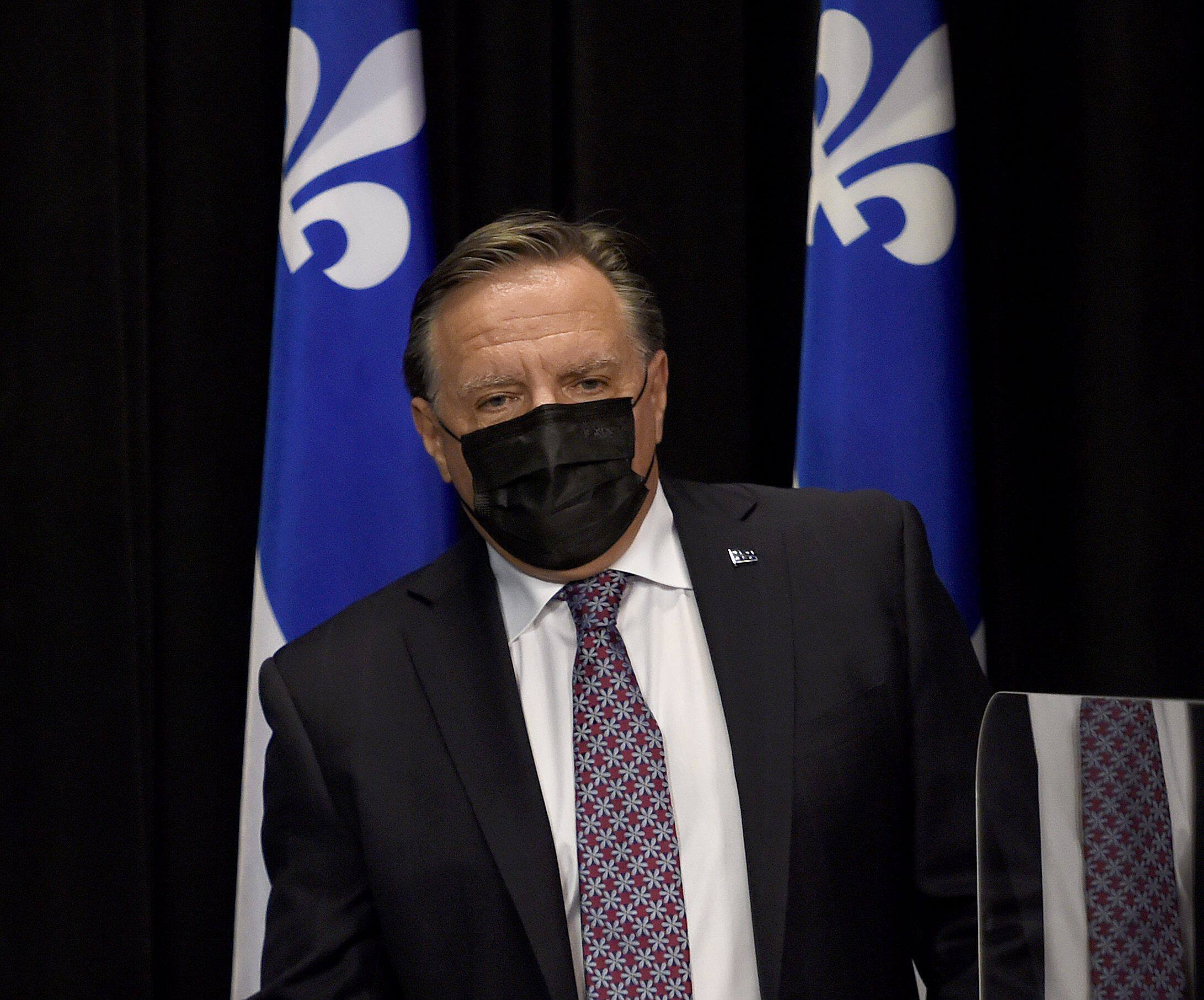COVID-19: Legault continuera de porter le masque