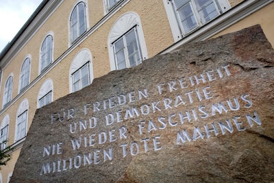 A memorial stone reading