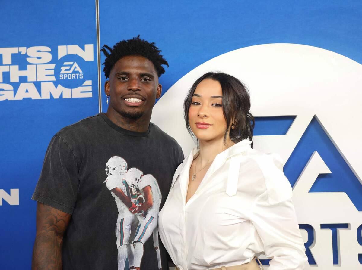 Tyreek Hill and his wife, <a href=