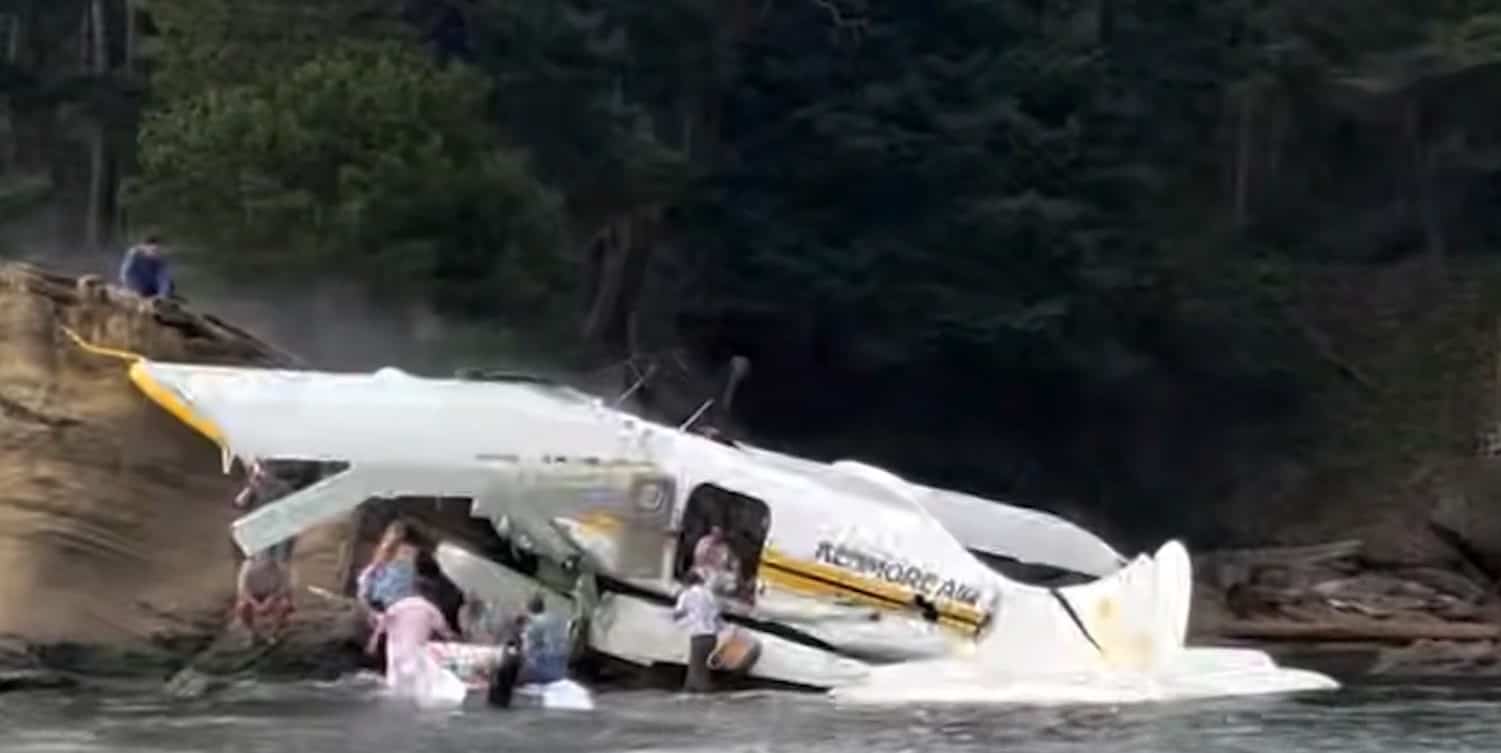 A seaplane carrying 11 people made an emergency landing and caught fire Thursday off the coast of Washington state.