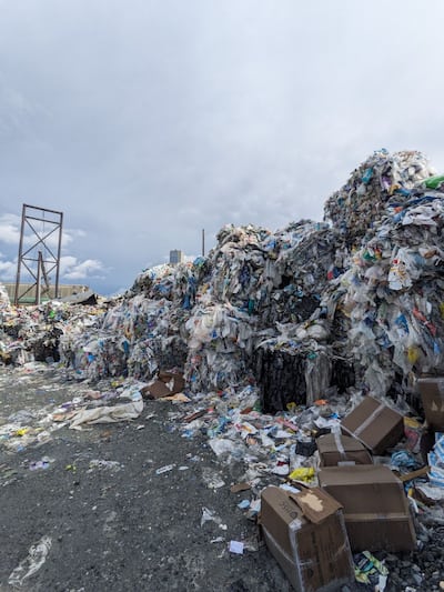 Several boxes including syringes, solutions, surgical masks, latex gloves and masks are stored in a dilapidated building in Val-des-Sources for recycling purposes.
