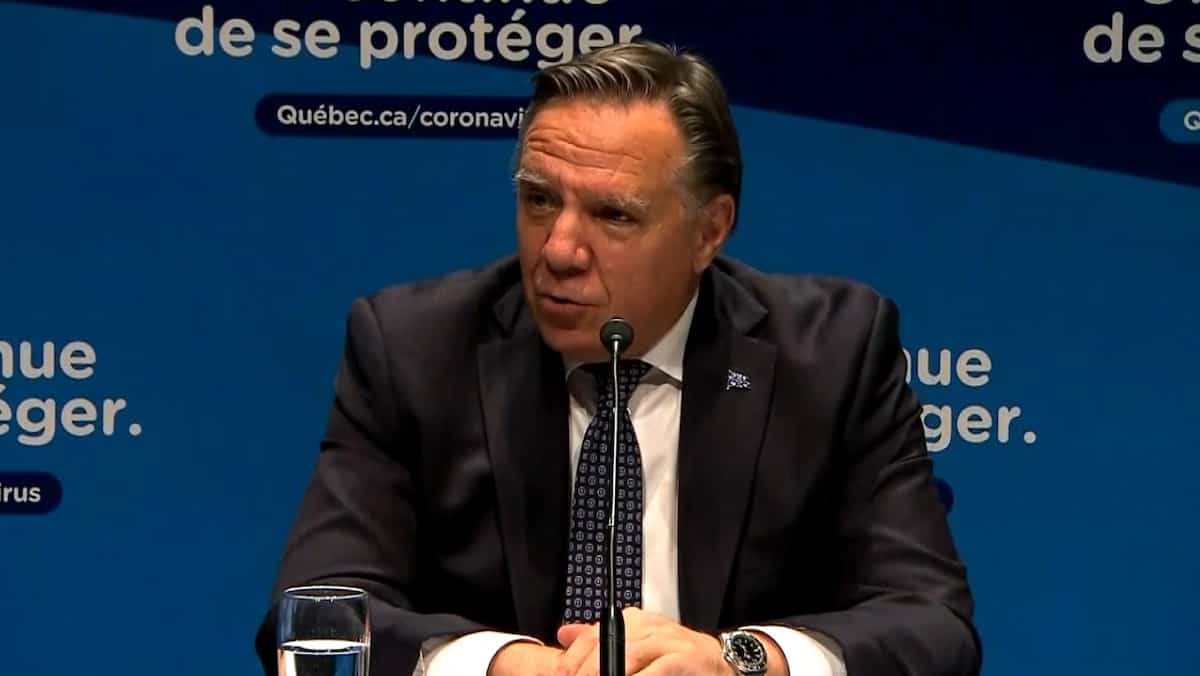 Legault flays a journalist from CHOI Radio X during a press briefing 1