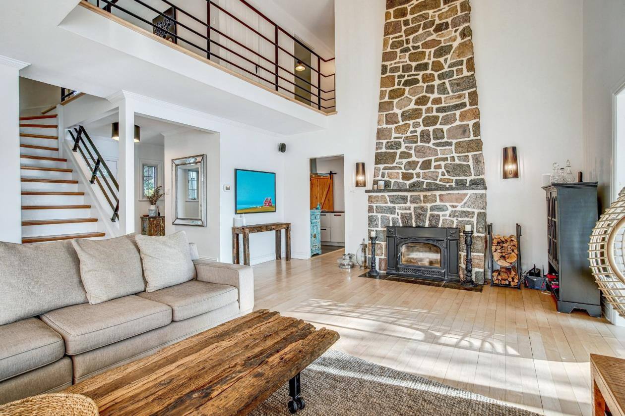 Une maison au bord de l’eau avec vue époustouflante sur le fleuve à